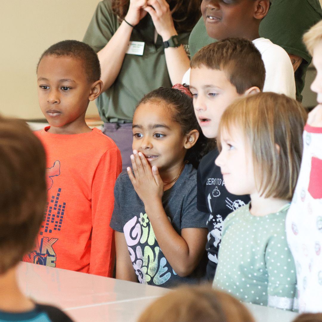 Kids gathered around a table